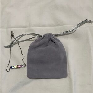 Rainbow adjustable bracelet with travel pouch